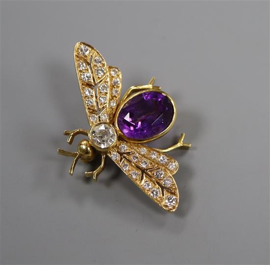 A yellow metal, amethyst and diamond set bug brooch, diameter 35mm.
